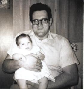 My Dad, John Turner, holding my wee baby self in 1973.